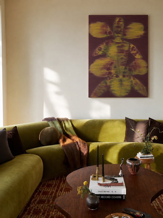 Orchid No. 02 — Aubergine staged above a green sofa